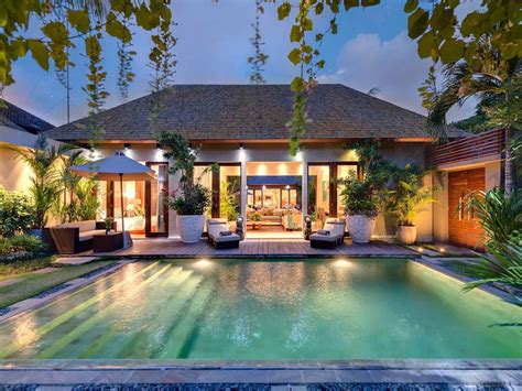 Experience paradise in this luxurious Bali-inspired estate with resort-inspired living and panoramic sunset views